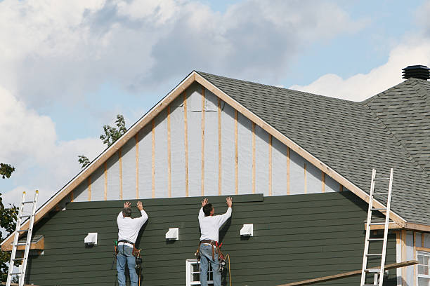 Professional Siding technician working in Newark, IL